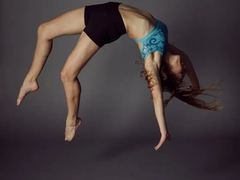 girl doing a backflip