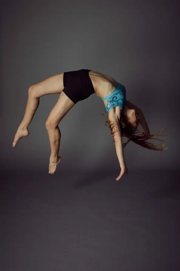 girl doing a backflip