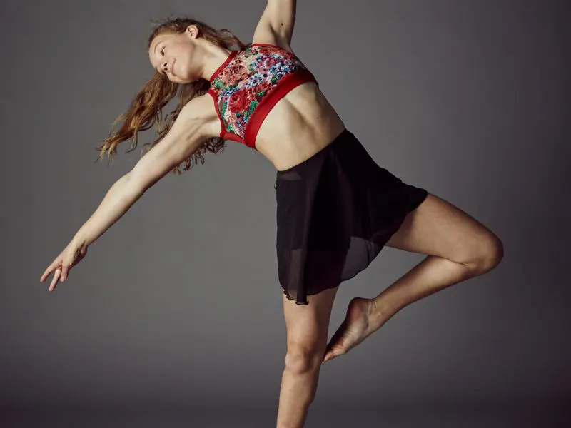 young girl leaning back in dance