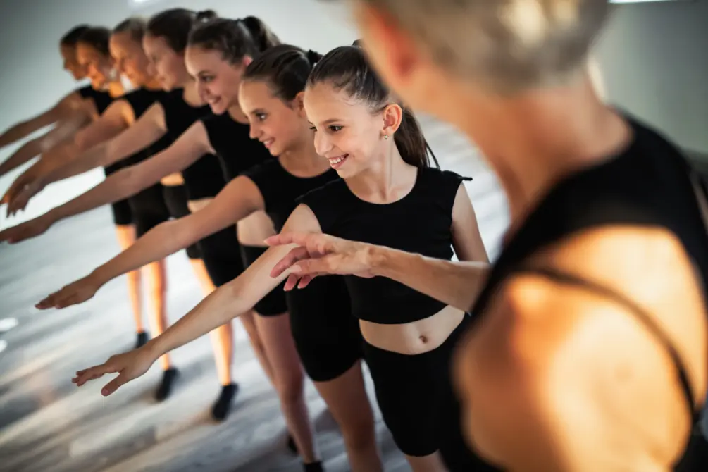Dance teacher with her students