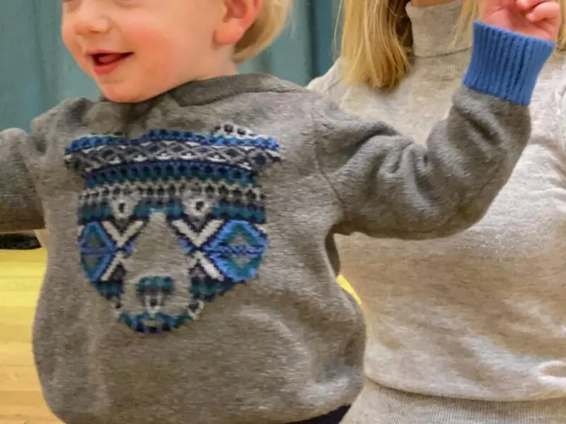 blonde baby in music and movement class