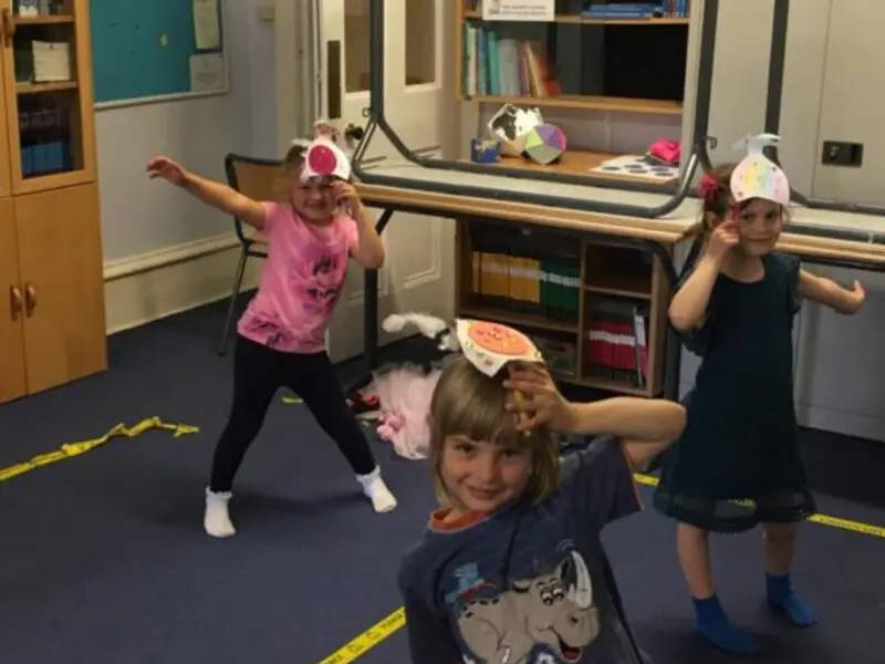 children having fun and dancing at summer camp