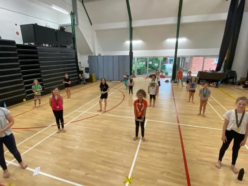 children at summer camp dancing