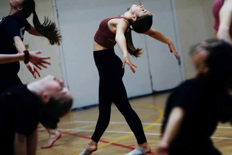 girl arching her back in a dance class