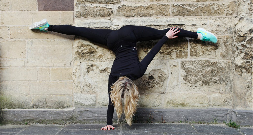 Bethany in a one handed hand stand